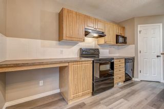 Photo 11: 52 COUGARSTONE Villa SW in Calgary: Cougar Ridge Detached for sale : MLS®# A1020063