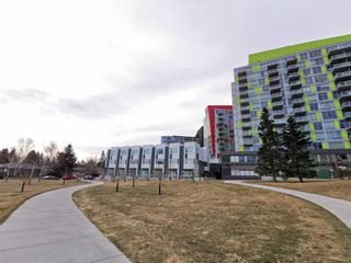 Photo 3: 102 20 Brentwood Common NW in Calgary: Brentwood Row/Townhouse for sale : MLS®# A2034227