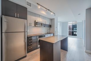 Photo 34: 411 550 Riverfront Avenue SE in Calgary: Downtown East Village Apartment for sale : MLS®# A1212416
