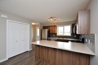 Photo 10: 52 SUNSET Road: Cochrane House for sale : MLS®# C4124887