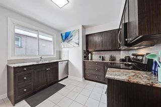 Photo 11: 710 53 Avenue SW in Calgary: Windsor Park Semi Detached for sale : MLS®# A1067398