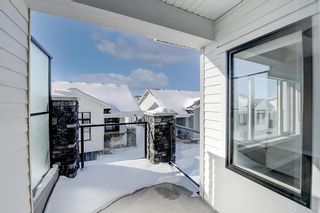 Photo 6: 908 Crestridge Common SW in Calgary: Crestmont Row/Townhouse for sale : MLS®# A2030391