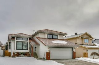 Photo 1: 127 Wood Valley Drive SW in Calgary: Woodbine Detached for sale : MLS®# A1062354