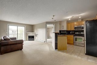Photo 4: 2308 8 BRIDLECREST Drive SW in Calgary: Bridlewood Condo for sale
