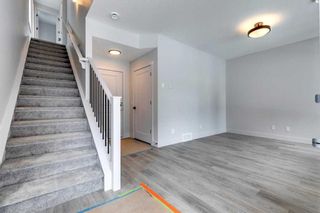 Photo 3: 57 Royal Elm Green NW in Calgary: Royal Oak Row/Townhouse for sale : MLS®# A2122522