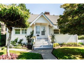 Photo 1: 327 ARBUTUS Street in New Westminster: Queens Park House for sale in "QUEENS PARK" : MLS®# V1081789