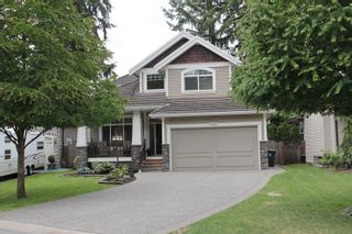 Photo 1: 4423 208A Street in Langley: Brookswood Langley House for sale in "Cedar Ridge" : MLS®# R2176787