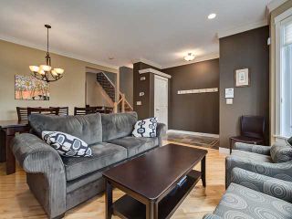 Photo 3: 209 26 AVE NW in CALGARY: Tuxedo Park Residential Attached for sale (Calgary)  : MLS®# C3614703