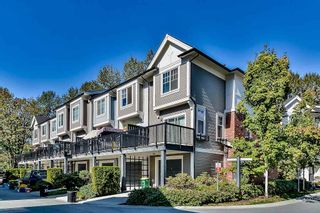 Photo 4: 105 3010 RIVERBEND Drive in Coquitlam: Coquitlam East Townhouse for sale in "WESTWOOD" : MLS®# R2109754