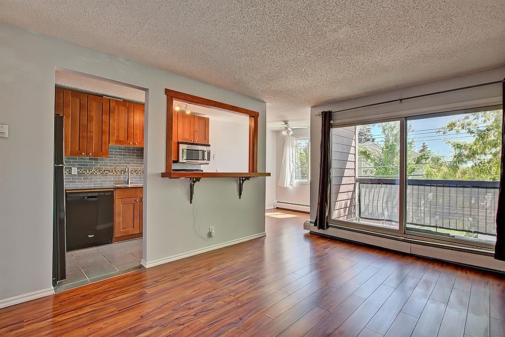 Main Photo: 103 1529 26 Avenue SW in Calgary: South Calgary Apartment for sale : MLS®# A2049651