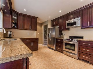 Photo 5: 7771 KERRYWOOD Crescent in Burnaby: Government Road House for sale (Burnaby North)  : MLS®# V1004231