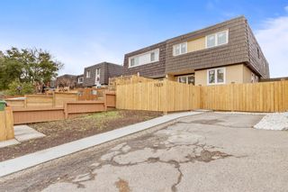 Main Photo: 7629 25 Street SE in Calgary: Ogden Row/Townhouse for sale : MLS®# A2010339