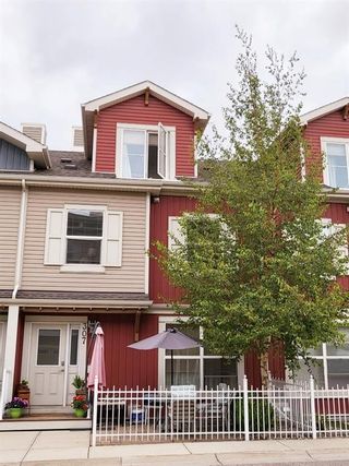 Photo 1: 307 10 Auburn Bay Avenue SE in Calgary: Auburn Bay Row/Townhouse for sale : MLS®# A1231979