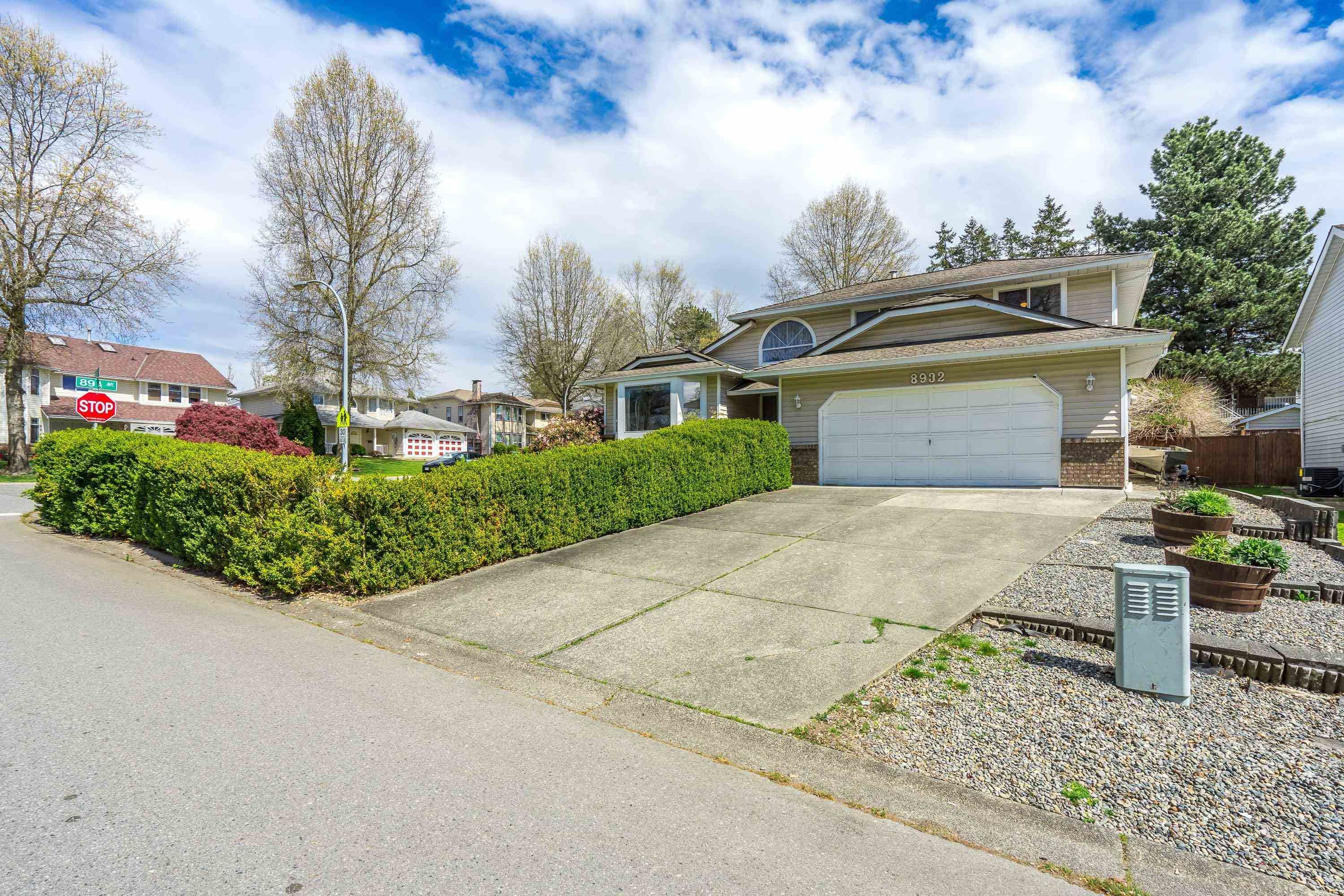 Main Photo: 8932 143A Street in Surrey: Bear Creek Green Timbers House for sale : MLS®# R2873602