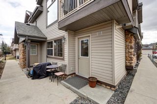 Main Photo: 101 23 Everridge Square SW in Calgary: Evergreen Row/Townhouse for sale : MLS®# A1214093