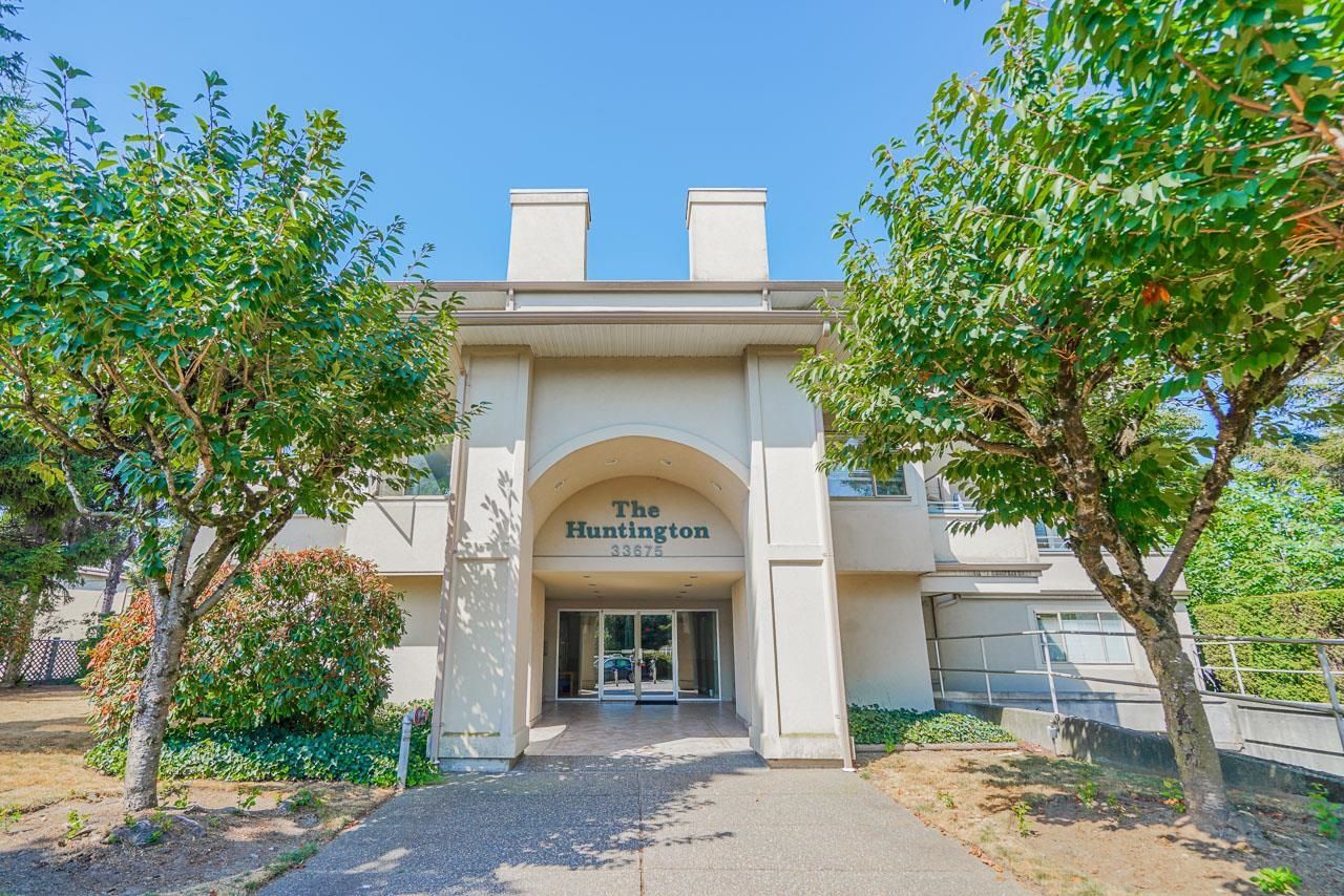 Main Photo: 202 33675 MARSHALL Road in Abbotsford: Central Abbotsford Condo for sale in "The Huntington" : MLS®# R2608485