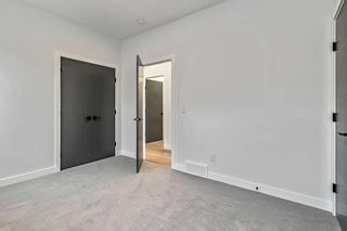 Photo 28: 420 24 Avenue NE in Calgary: Winston Heights/Mountview Semi Detached (Half Duplex) for sale : MLS®# A2115046