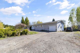Photo 1: 40160 SOUTH PARALLEL Road in Abbotsford: Sumas Prairie House for sale : MLS®# R2869650