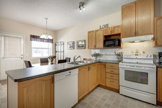 Photo 11: 208 Prestwick Landing SE in Calgary: McKenzie Towne Row/Townhouse for sale : MLS®# A2028238