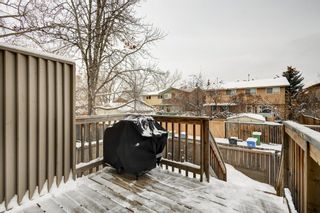 Photo 21: 143 Woodvale Bay SW in Calgary: Woodlands Row/Townhouse for sale : MLS®# A2022754