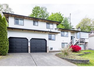 Photo 1: 2319 WOODSTOCK Drive in Abbotsford: Abbotsford East House for sale in "McMillan" : MLS®# R2743709