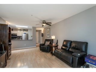 Photo 15: 407 20277 53 Avenue in Langley: Langley City Condo for sale in "THE METRO II" : MLS®# R2466451