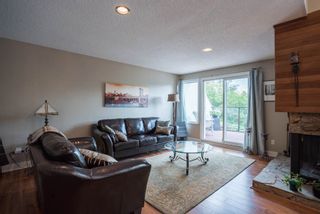 Photo 2: 491 SAN REMO Drive in Port Moody: North Shore Pt Moody House for sale : MLS®# R2073046