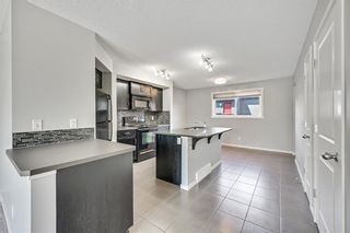 Photo 9: 212 Walden Drive SE in Calgary: Walden Row/Townhouse for sale : MLS®# A1236888