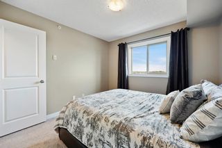 Photo 24: 7401 403 Mackenzie Way SW: Airdrie Apartment for sale : MLS®# A2000977