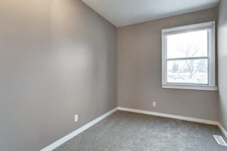 Photo 22: 4403 Bow Trail SW in Calgary: Rosscarrock Row/Townhouse for sale : MLS®# A2022311