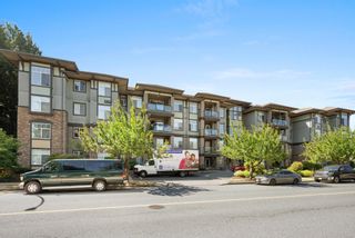 Photo 1: 206 33338 MAYFAIR Avenue in Abbotsford: Central Abbotsford Condo for sale in "The Sterling" : MLS®# R2802916