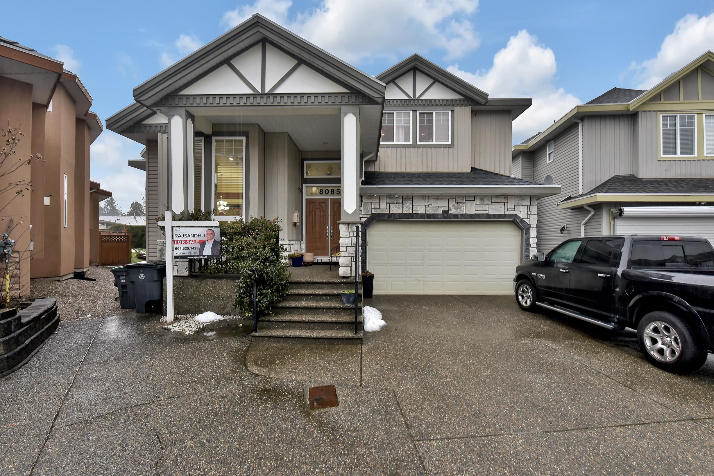 Main Photo: 8085 135A Street in Surrey: Queen Mary Park Surrey House for sale in "WEST NEWTON" : MLS®# R2642393