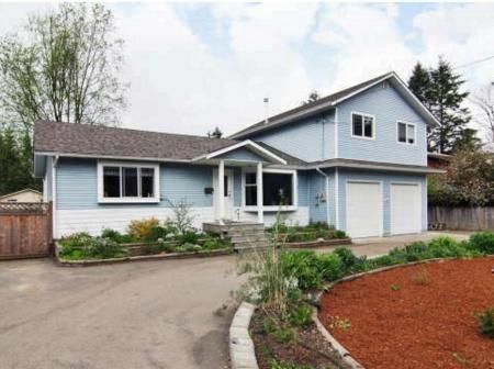 Main Photo: Extensively Updated Family Home With Master Bedroom On Main Floor