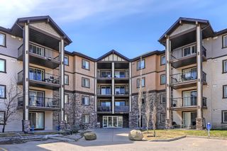 Photo 1: 2413 60 Panatella Street NW in Calgary: Panorama Hills Apartment for sale : MLS®# A2045359