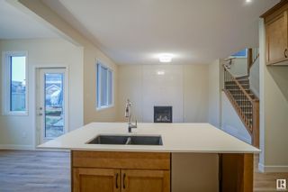 Photo 11: 1233 16A Avenue in Edmonton: Zone 30 House for sale : MLS®# E4376401