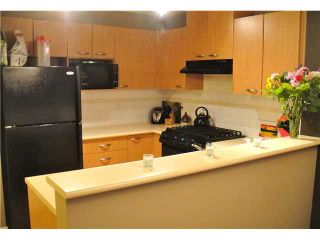 Photo 3: 408 2966 SILVER SPRINGS Boulevard in Coquitlam: Westwood Plateau Condo for sale in "TAMARISK" : MLS®# V933089