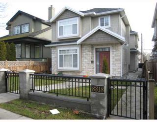 Photo 1: 8318 FREMLIN Street in Vancouver: Marpole 1/2 Duplex for sale (Vancouver West)  : MLS®# V752493