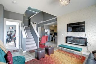 Photo 5: 6 67 West Coach Manor SW in Calgary: West Springs Row/Townhouse for sale : MLS®# A1226623