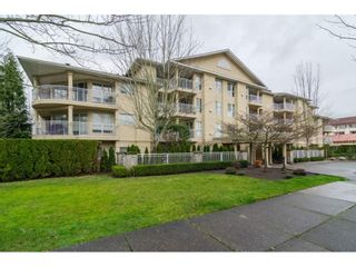 Photo 1: 103 13727 74 Avenue in Surrey: East Newton Condo for sale in "King's Court - Newton Centre" : MLS®# R2126429