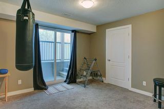 Photo 22: 321 Strathcona Circle: Strathmore Row/Townhouse for sale : MLS®# A1211128