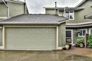 Photo 1: 54 16061 85 Avenue in Surrey: Fleetwood Tynehead Townhouse for sale in "Parc Seville" : MLS®# R2165438