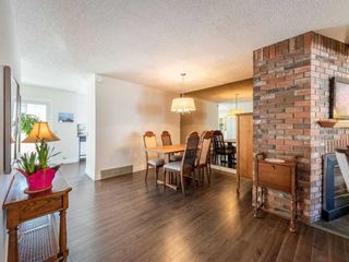 Photo 11: 393 Point Mckay Gardens NW in Calgary: Point McKay Row/Townhouse for sale : MLS®# A2120125