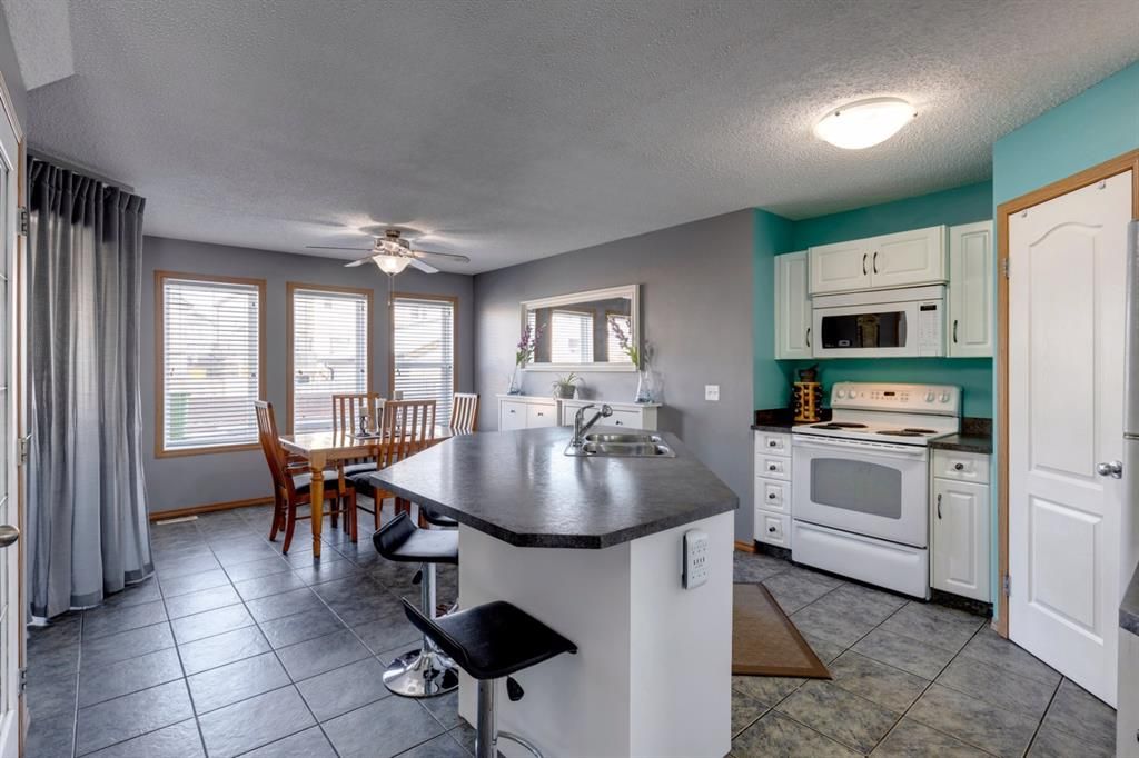 Photo 7: Photos: 153 Covebrook Place NE in Calgary: Coventry Hills Detached for sale : MLS®# A1192132