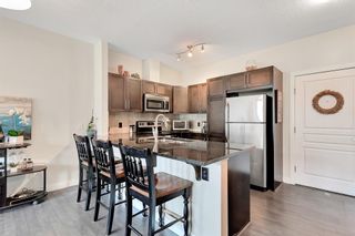 Photo 6: 307 76 Panatella Road NW in Calgary: Panorama Hills Apartment for sale : MLS®# A2051167