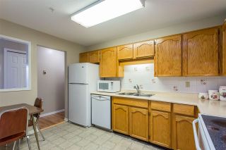 Photo 5: 104 31850 UNION Avenue in Abbotsford: Abbotsford West Condo for sale in "Fernwood Manor" : MLS®# R2389040