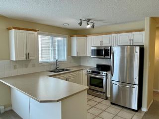 Photo 3: 1212 7451 Springbank Boulevard SW in Calgary: Springbank Hill Apartment for sale : MLS®# A2042328
