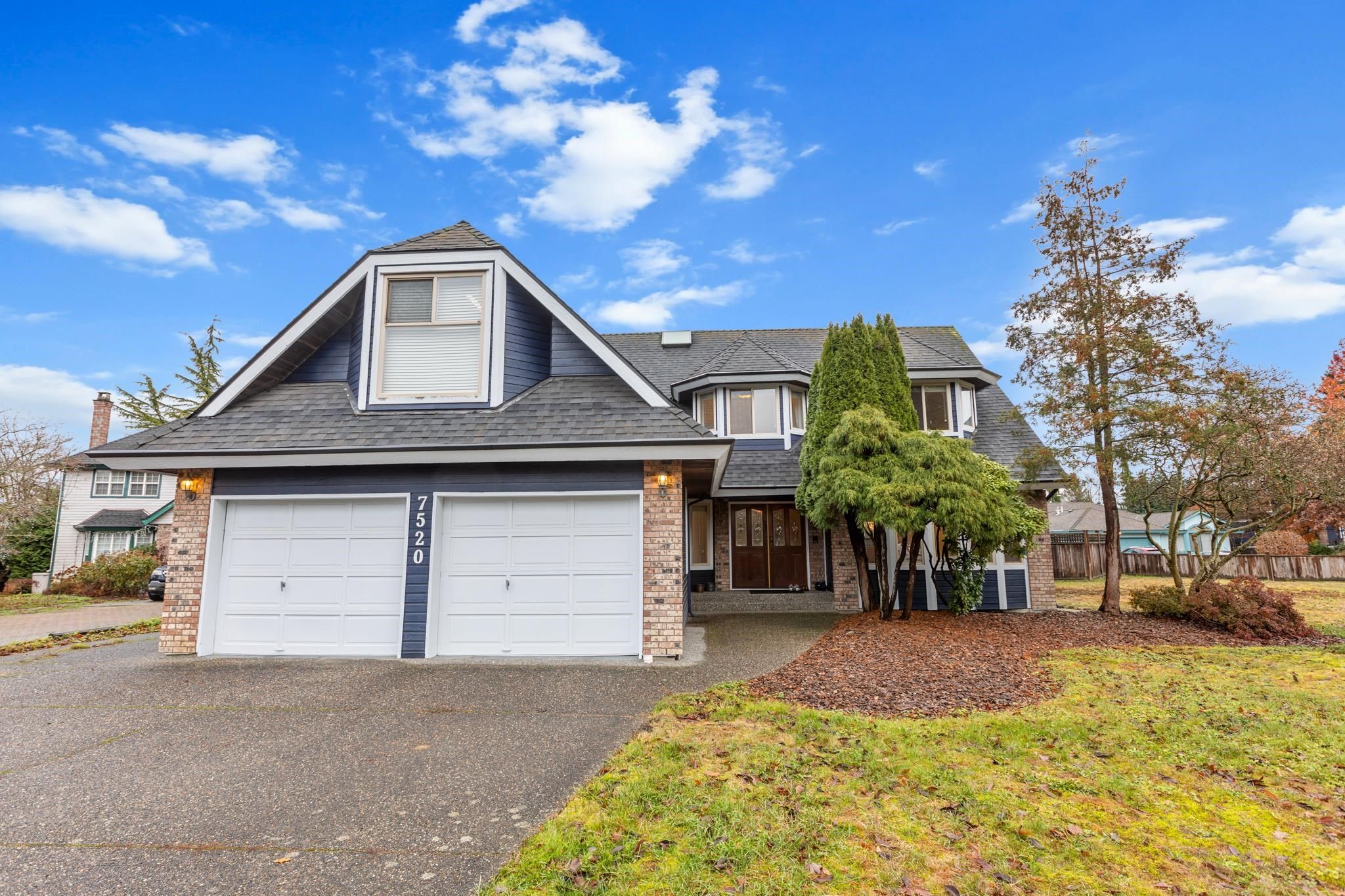 Main Photo: 7520 150A Street in Surrey: East Newton House for sale in "CHIMNEY HILLS" : MLS®# R2847345