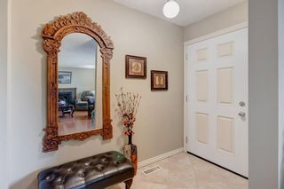 Photo 4: 206 Pinestream Place NE in Calgary: Pineridge Row/Townhouse for sale : MLS®# A1216582