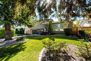Main Photo: 725 80 Avenue SW in Calgary: Kingsland Detached for sale : MLS®# A2051083
