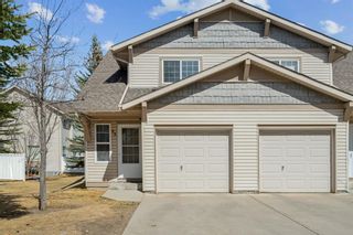 Photo 1: 82 Eversyde Court SW in Calgary: Evergreen Row/Townhouse for sale : MLS®# A2123607